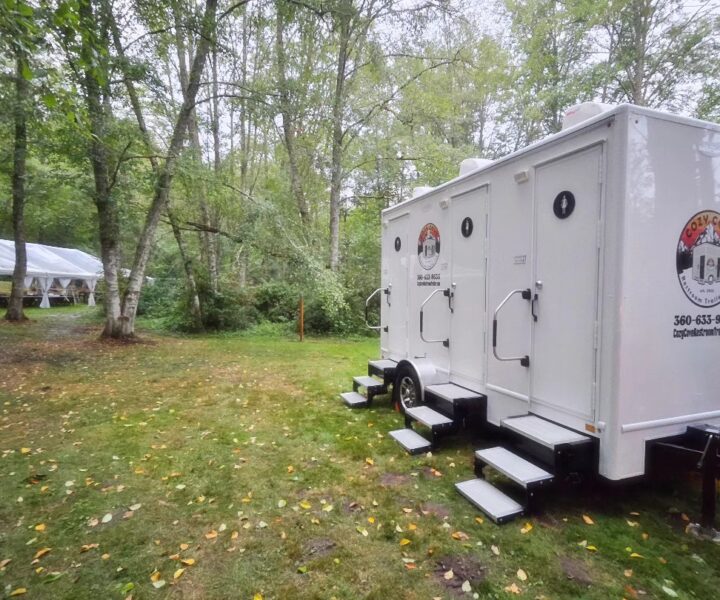 Cozy Cove Restroom Trailer Rentals 4-door luxury bathroom trailer rentals for events. The Four Seasons Restroom Trailer 4-stations