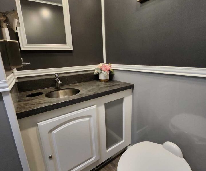 Cozy Cove Restroom Trailer Rentals 4-door luxury restroom rentals for events near me. The Four Seasons Restroom Trailer 4 stations near me